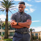 Emmanuel wearing size Small